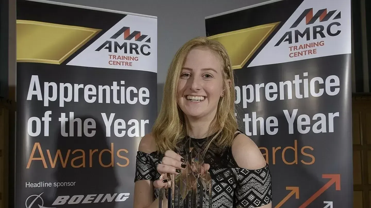 Leigh holding her 'Apprentice of the Year' award.